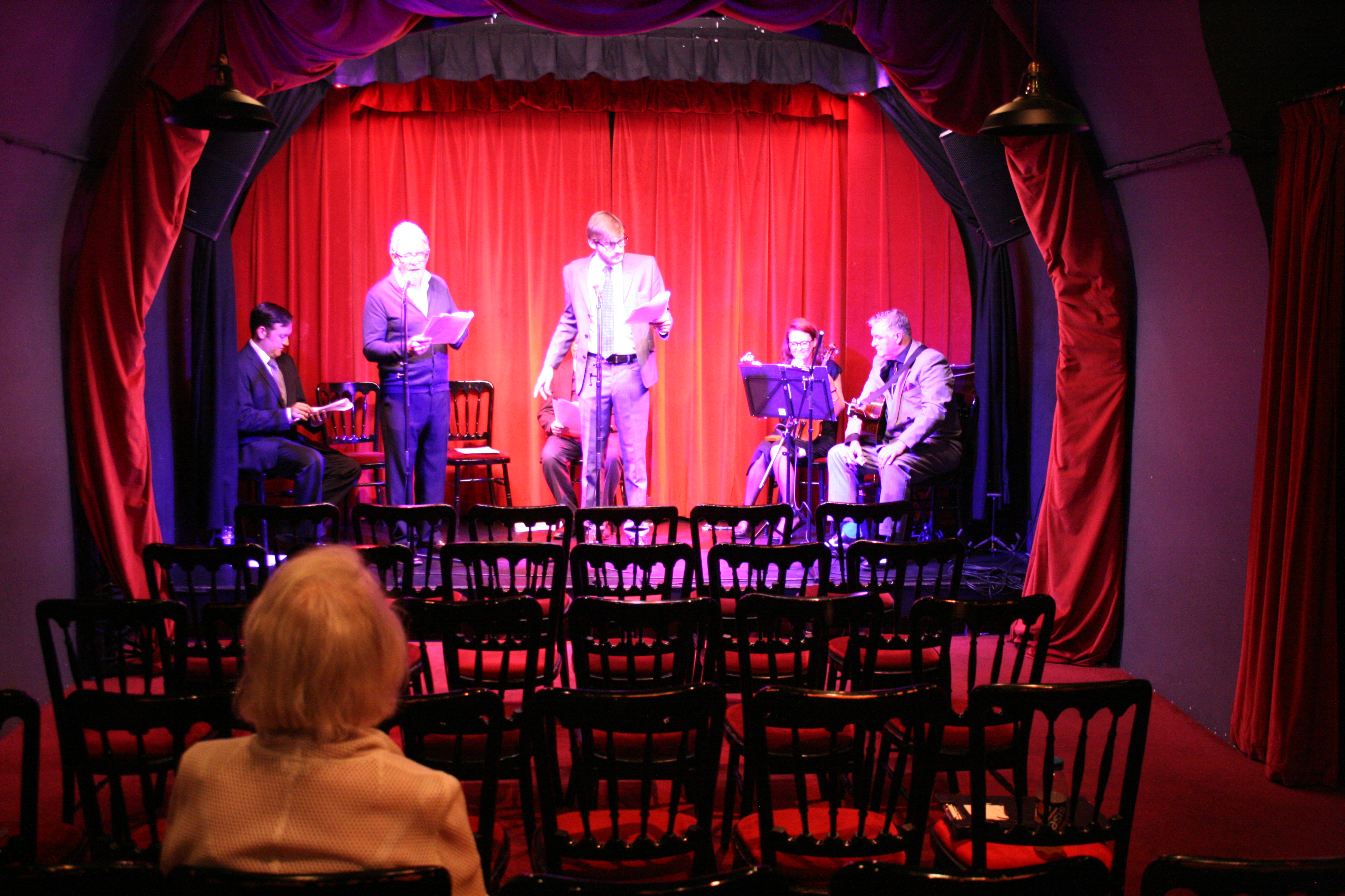 The cast are watched by Norma 