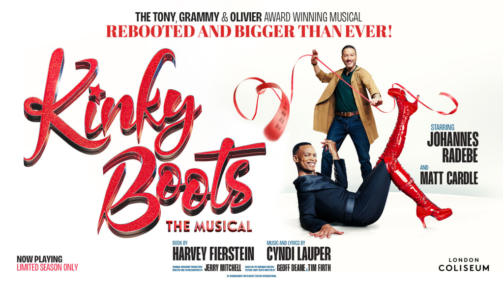 Promotional poster for Kinky Boots The Musical. The title appears in large, glittering red script on a white background. To the right, Johannes Radebe reclines on the floor in a black outfit, smiling and kicking one leg high in a shiny red thigh-high boot, while Matt Cardle stands behind him holding a long red measuring tape. Text above reads “Rebooted and bigger than ever,” with credits below for Harvey Fierstein (book) and Cyndi Lauper (music and lyrics), and a note that it is now playing for a limited season at the London Coliseum.